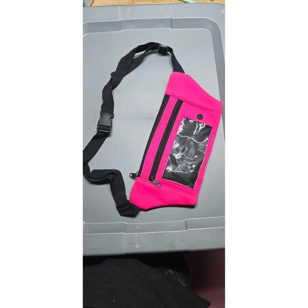 neon pink neoprene running belt or fanny pack with a clear phone window